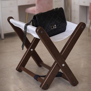 Handbag stand for salon